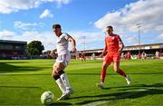 9 August 2025; Dayle Rooney of Bohemians in action against Evan Caffrey of Shelbourne during the SSE Airtricity Men's Premier Division match between Shelbourne and Bohemians at Tolka Park in Dublin. Photo by Tyler Miller/Sportsfile