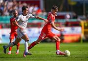 9 August 2025; Sean Moore of Shelbourne in action against Connor Parsons of Bohemians during the SSE Airtricity Men's Premier Division match between Shelbourne and Bohemians at Tolka Park in Dublin. Photo by Piaras Ó Mídheach/Sportsfile