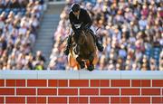 9 August 2025; Andrew Hodgins of Ireland, competing on Shanaclough Luichew, in the Defender Puissance during the Dublin Horse Show at the RDS Arena in Dublin. Photo by Shauna Clinton/Sportsfile