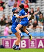 10 August 2025; Clodagh Tynan, left, and Eimear Hassett of Laois celebrate at the final whistle of the Glen Dimplex All-Ireland Premier Junior Camogie Championship final match between Armagh and Laois at Croke Park in Dublin. Photo by Ramsey Cardy/Sportsfile