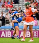 10 August 2025; Clodagh Tynan, left, and Eimear Hassett of Laois celebrate at the final whistle of the Glen Dimplex All-Ireland Premier Junior Camogie Championship final match between Armagh and Laois at Croke Park in Dublin. Photo by Ramsey Cardy/Sportsfile