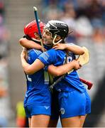 10 August 2025; Kaylee O’Keefe, left, and Shona Jones of Laois celebrate at the final whistle of the Glen Dimplex All-Ireland Premier Junior Camogie Championship final match between Armagh and Laois at Croke Park in Dublin. Photo by Ramsey Cardy/Sportsfile