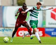 10 August 2025; Jeannot Esua of Galway United in action against Connor Malley of Shamrock Rovers during the SSE Airtricity Men's Premier Division match between Galway United and Shamrock Rovers at Eamonn Deacy Park in Galway. Photo by Thomas Flinkow/Sportsfile