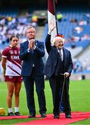 10 August 2025; President of Ireland Michael D Higgins waves to the crowd after meeting the teams and officials before the match on his last official visit to Croke Park while in office at the Glen Dimplex All-Ireland Senior Camogie Championship final match between Cork and Galway at Croke Park in Dublin. Photo by Piaras Ó Mídheach/Sportsfile