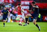 10 August 2025; Simon Power of St Patrick's Athletic in action against Sebastian Quirk of Sligo Rovers during the SSE Airtricity Men's Premier Division match between St Patrick's Athletic and Sligo Rovers at Richmond Park in Dublin. Photo by Tyler Miller/Sportsfile