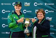 10 August 2025; Ireland captain Gaby Lewis is presented with the series trophy by Cricket Ireland president Donna Armstrong after match three of the Women's T20 International Series between Ireland and Pakistan at Castle Avenue Cricket Ground in Dublin. Photo by Seb Daly/Sportsfile