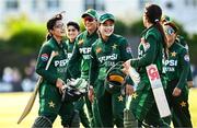 10 August 2025; Pakistan captain Fatima Sana, centre, and teammates after their side's victory during match three of the Women's T20 International Series between Ireland and Pakistan at Castle Avenue Cricket Ground in Dublin. Photo by Seb Daly/Sportsfile