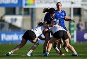 10 August 2025; Milita Valteryte of Leinster is tackled by Ulster players Orlaith Maguire, left, and Ava Boyle during the PwC U-18 Girls Interprovincial Series match between Leinster and Ulster at Energia Park in Dublin. Photo by Shauna Clinton/Sportsfile