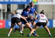 10 August 2025; Milita Valteryte of Leinster is tackled by Ulster players Orlaith Maguire, left, and Ava Boyle during the PwC U-18 Girls Interprovincial Series match between Leinster and Ulster at Energia Park in Dublin. Photo by Shauna Clinton/Sportsfile