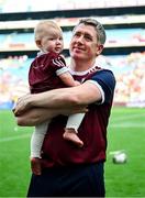10 August 2025; Galway manager Cathal Murray with his son Aodhán after victory in the Glen Dimplex All-Ireland Senior Camogie Championship final match between Cork and Galway at Croke Park in Dublin. Photo by Piaras Ó Mídheach/Sportsfile