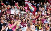 10 August 2025; Galway captain Carrie Dolan lifts the O'Duffy Cup after her side's victory in the Glen Dimplex All-Ireland Senior Camogie Championship final match between Cork and Galway at Croke Park in Dublin. Photo by Ramsey Cardy/Sportsfile