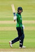 10 August 2025; Ireland batter Orla Prendergast acknowledges the crowd after scoring 50 runs during match three of the Women's T20 International Series between Ireland and Pakistan at Castle Avenue Cricket Ground in Dublin. Photo by Peter Langan/Sportsfile