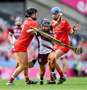 10 August 2025; Aoife Donohue of Galway in action against Ashling Thompson, left, and Aoife Healy of Cork during the Glen Dimplex All-Ireland Senior Camogie Championship final match between Cork and Galway at Croke Park in Dublin. Photo by Ramsey Cardy/Sportsfile