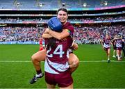 10 August 2025; Galway players Aoife Donohue, behind, and Jennifer Hughes celebrate after their side's victory in the Glen Dimplex All-Ireland Senior Camogie Championship final match between Cork and Galway at Croke Park in Dublin. Photo by Piaras Ó Mídheach/Sportsfile