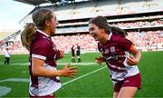10 August 2025; Galway players Ciara Hickey, left, an Ally Hesnan celebrate after their side's victory in the Glen Dimplex All-Ireland Senior Camogie Championship final match between Cork and Galway at Croke Park in Dublin. Photo by Piaras Ó Mídheach/Sportsfile