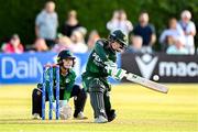10 August 2025; Pakistan batter Muneeba Ali plays a shot, watched by Ireland wicketkeeper Amy Hunter, during match three of the Women's T20 International Series between Ireland and Pakistan at Castle Avenue Cricket Ground in Dublin. Photo by Seb Daly/Sportsfile