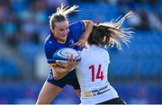 10 August 2025; Lillie Harney of Leinster is tackled by Natalie Turner of Ulster during the PwC U-18 Girls Interprovincial Series match between Leinster and Ulster at Energia Park in Dublin.  Photo by Shauna Clinton/Sportsfile