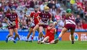 10 August 2025; Hannah Looney of Cork passess under pressure from Mairead Dillion of Galway, 13, during the Glen Dimplex All-Ireland Senior Camogie Championship final match between Cork and Galway at Croke Park in Dublin. Photo by Piaras Ó Mídheach/Sportsfile