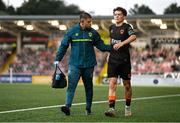 8 August 2025; Kitt Nelson of Cork City after picking up an injury during the SSE Airtricity Men's Premier Division match between Derry City and Cork City at The Ryan McBride Brandywell Stadium in Derry. Photo by Ramsey Cardy/Sportsfile
