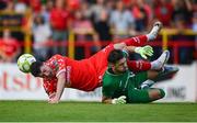 12 August 2025; Ali Coote of Shelbourne is tackled by Rijeka goalkeeper Martin Zlomislic during the UEFA Europa League Third Qualifying Round 2nd Leg match between Shelbourne and Rijeka at Tolka Park in Dublin. Photo by Stephen McCarthy/Sportsfile