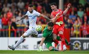 12 August 2025; Ali Coote of Shelbourne is tackled by Rijeka goalkeeper Martin Zlomislic during the UEFA Europa League Third Qualifying Round 2nd Leg match between Shelbourne and Rijeka at Tolka Park in Dublin. Photo by Stephen McCarthy/Sportsfile
