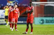 12 August 2025; Mipo Odubeko of Shelbourne reacts after his side conceded their second goal, scored by Tiago Dantas of Rijeka, during the UEFA Europa League Third Qualifying Round 2nd Leg match between Shelbourne and Rijeka at Tolka Park in Dublin. Photo by Ben McShane/Sportsfile