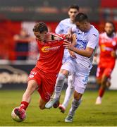12 August 2025; John Martin of Shelbourne in action against Mladen Devetak of Rijeka during the UEFA Europa League Third Qualifying Round 2nd Leg match between Shelbourne and Rijeka at Tolka Park in Dublin. Photo by Stephen McCarthy/Sportsfile