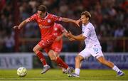 12 August 2025; Harry Wood of Shelbourne in action against Toni Fruk of Rijeka during the UEFA Europa League Third Qualifying Round 2nd Leg match between Shelbourne and Rijeka at Tolka Park in Dublin. Photo by Stephen McCarthy/Sportsfile