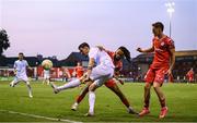 12 August 2025; Stjepan Radeljic of Rijeka in action against Milan Mbeng, centre, and John Martin of Shelbourne during the UEFA Europa League Third Qualifying Round 2nd Leg match between Shelbourne and Rijeka at Tolka Park in Dublin. Photo by Stephen McCarthy/Sportsfile