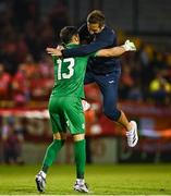 12 August 2025; Rijeka manager Radomir Dalovic, right, celebrates with Rijeka goalkeeper Martin Zlomislic after the UEFA Europa League Third Qualifying Round 2nd Leg match between Shelbourne and Rijeka at Tolka Park in Dublin. Photo by Ben McShane/Sportsfile
