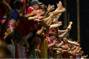12 August 2025; Shelbourne supporters celebrate their goal during the UEFA Europa League Third Qualifying Round 2nd Leg match between Shelbourne and Rijeka at Tolka Park in Dublin. Photo by Stephen McCarthy/Sportsfile