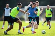 13 August 2025; Trevor Clarke, centre, in action against Roberto Lopes, left, and Darragh Nugent during a Shamrock Rovers training session at Roadstone Group Sports Club in Dublin. Photo by Seb Daly/Sportsfile