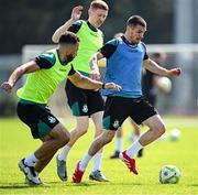 13 August 2025; Trevor Clarke, right, in action against Roberto Lopes, left, and Darragh Nugent during a Shamrock Rovers training session at Roadstone Group Sports Club in Dublin. Photo by Seb Daly/Sportsfile