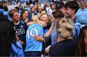 3 August 2025; Nicole Owens of Dublin celebrates with family and friends after victory in the TG4 All-Ireland Ladies Football Senior Championship final match between Dublin and Meath at Croke Park in Dublin. Photo by Piaras Ó Mídheach/Sportsfile