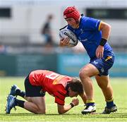 13 August 2025; Brion Donagh of Leinster in action against Liam O'Brien of Munster during the PwC U-18 Boys Interprovincial Series match between Leinster and Munster at Energia Park in Dublin. Photo by Tyler Miller/Sportsfile
