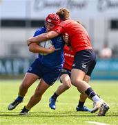 13 August 2025; Brion Donagh of Leinster in action against Eddie Dooley of Munster during the PwC U-18 Boys Interprovincial Series match between Leinster and Munster at Energia Park in Dublin. Photo by Tyler Miller/Sportsfile