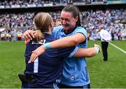 3 August 2025; Dublin players Abby Shiels, left, and Niamh Hetherton celebrate after the TG4 All-Ireland Ladies Football Senior Championship final match between Dublin and Meath at Croke Park in Dublin. Photo by Piaras Ó Mídheach/Sportsfile