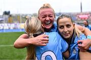 3 August 2025; Dublin players Carla Rowe, centre, with team-mates Aoife Curran, left, and Rebecca McDonnell after the TG4 All-Ireland Ladies Football Senior Championship final match between Dublin and Meath at Croke Park in Dublin. Photo by Piaras Ó Mídheach/Sportsfile