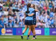 3 August 2025; Dublin players Abby Shiels and Leah Caffrey, left, celebrate after victory in the TG4 All-Ireland Ladies Football Senior Championship final match between Dublin and Meath at Croke Park in Dublin. Photo by Piaras Ó Mídheach/Sportsfile