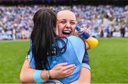 3 August 2025; Dublin players Sinéad Goldrick and Abby Shiels, behind, celebrate after the TG4 All-Ireland Ladies Football Senior Championship final match between Dublin and Meath at Croke Park in Dublin. Photo by Piaras Ó Mídheach/Sportsfile
