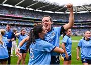 3 August 2025; Dublin players Sinéad Goldrick, left, and Hannah Tyrrell celebrate after the TG4 All-Ireland Ladies Football Senior Championship final match between Dublin and Meath at Croke Park in Dublin. Photo by Piaras Ó Mídheach/Sportsfile