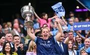 3 August 2025; Dublin goalkeeper Abby Shiels lifts the Brendan Martin Cup after the TG4 All-Ireland Ladies Football Senior Championship final match between Dublin and Meath at Croke Park in Dublin. Photo by Piaras Ó Mídheach/Sportsfile
