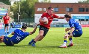13 August 2025; Jack Hayes of Munster is tackled by Finn Brennan, left, and Johnny Woods of Leinster during the PwC U-18 Boys Interprovincial Series match between Leinster and Munster at Energia Park in Dublin. Photo by Tyler Miller/Sportsfile