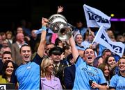 3 August 2025; Dublin players Lauren Magee, left, and Aoife Kane lift the Brendan Martin Cup after the TG4 All-Ireland Ladies Football Senior Championship final match between Dublin and Meath at Croke Park in Dublin. Photo by Piaras Ó Mídheach/Sportsfile