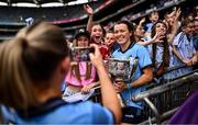 3 August 2025; Leah Caffrey of Dublin with the Brendan Martin Cup after the TG4 All-Ireland Ladies Football Senior Championship final match between Dublin and Meath at Croke Park in Dublin. Photo by Piaras Ó Mídheach/Sportsfile