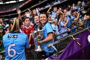 3 August 2025; Leah Caffrey of Dublin with the Brendan Martin Cup after the TG4 All-Ireland Ladies Football Senior Championship final match between Dublin and Meath at Croke Park in Dublin. Photo by Piaras Ó Mídheach/Sportsfile