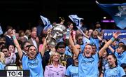 3 August 2025; Dublin players Niamh Crowley, left, and Niamh Donlon lift the Brendan Martin Cup after the TG4 All-Ireland Ladies Football Senior Championship final match between Dublin and Meath at Croke Park in Dublin. Photo by Piaras Ó Mídheach/Sportsfile