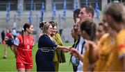 3 August 2025; Louth captain Áine Breen of Louth introduces her team-mates to LGFA President Trina Murray, front, and TG4 CEO Deirdre Ní Choistín before the TG4 All-Ireland Ladies Football Junior Championship final match between Antrim and Louth at Croke Park in Dublin. Photo by Piaras Ó Mídheach/Sportsfile