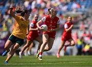 3 August 2025; Kate Flood of Louth in action against Bronagh Devlin of Antrim during the TG4 All-Ireland Ladies Football Junior Championship final match between Antrim and Louth at Croke Park in Dublin. Photo by Piaras Ó Mídheach/Sportsfile