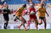 3 August 2025; Aoife Russell of Louth in action against Ciara Brown, left, and Carla McKenna of Antrim during the TG4 All-Ireland Ladies Football Junior Championship final match between Antrim and Louth at Croke Park in Dublin. Photo by Piaras Ó Mídheach/Sportsfile